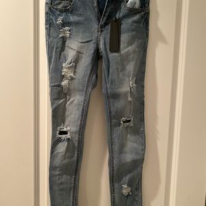 Black Label frayed hem skinny jeans. Size 27.